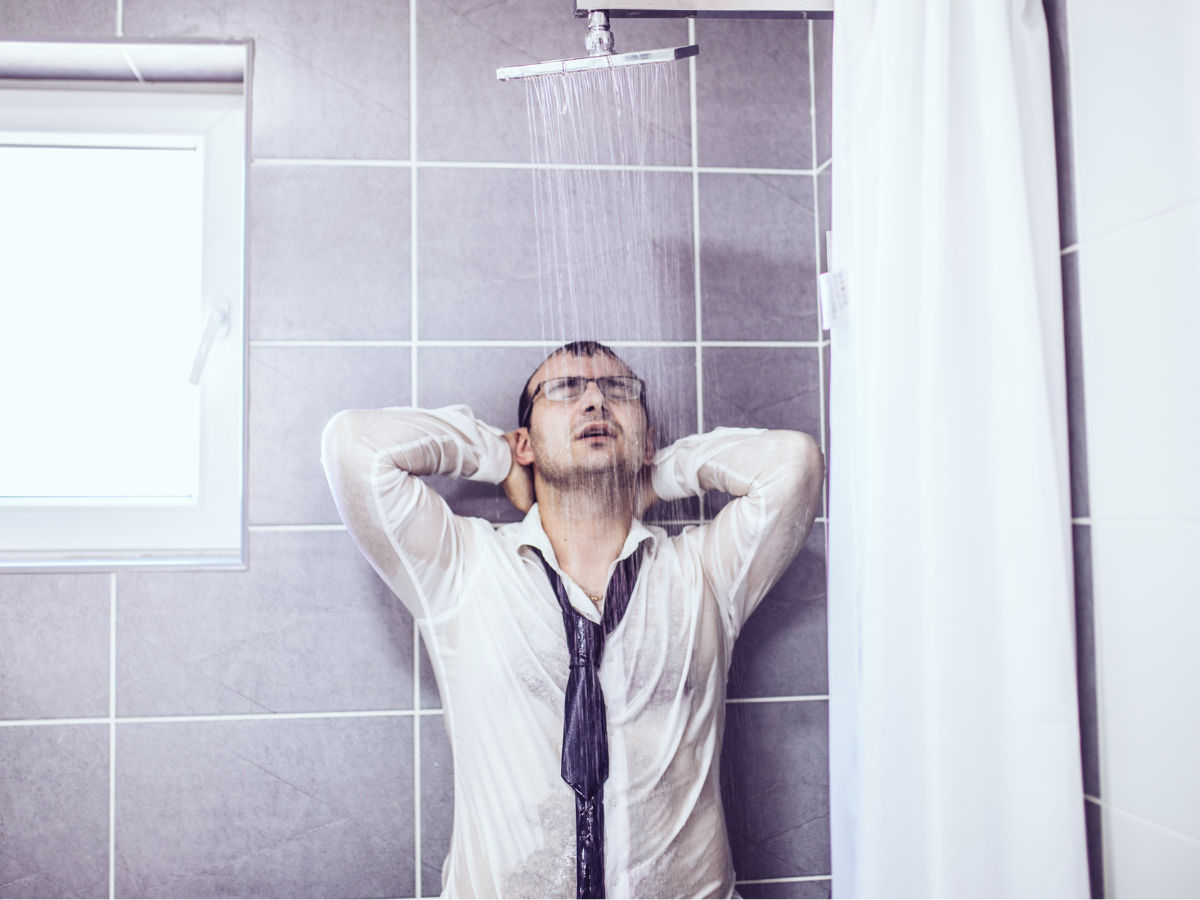 Man in shower with public speaking nerves