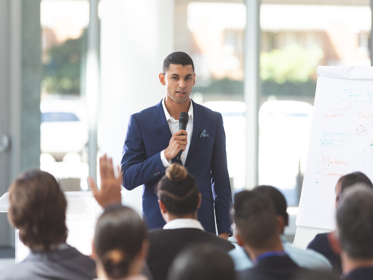 charismatic speaker addresses an audience