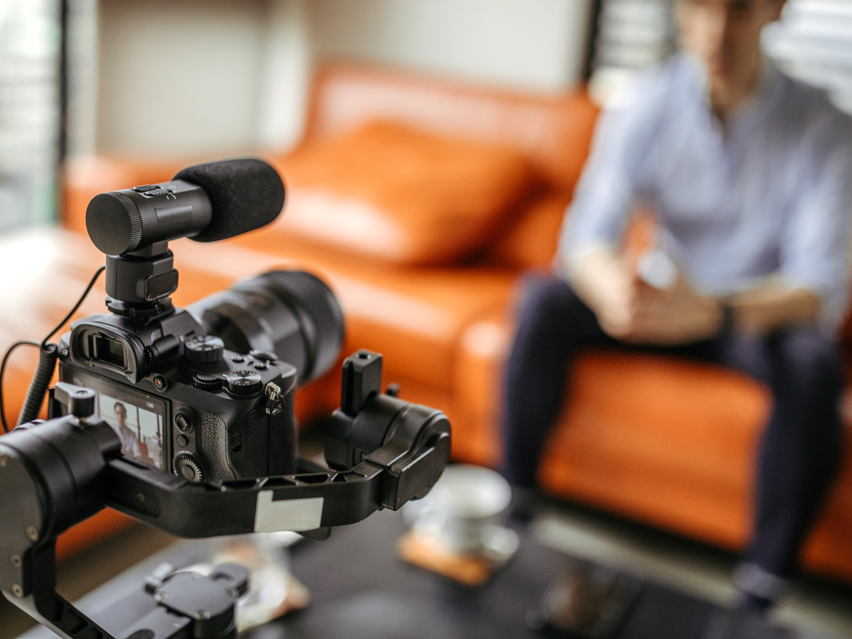 man speaking on camera